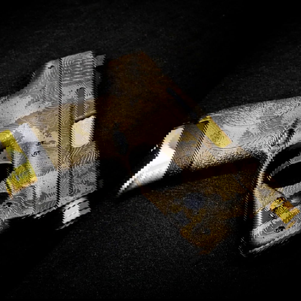 Custom Cerkote and Lasering on a  M & P