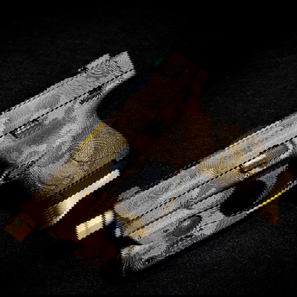Custom Cerakote and Lasering on a M & P