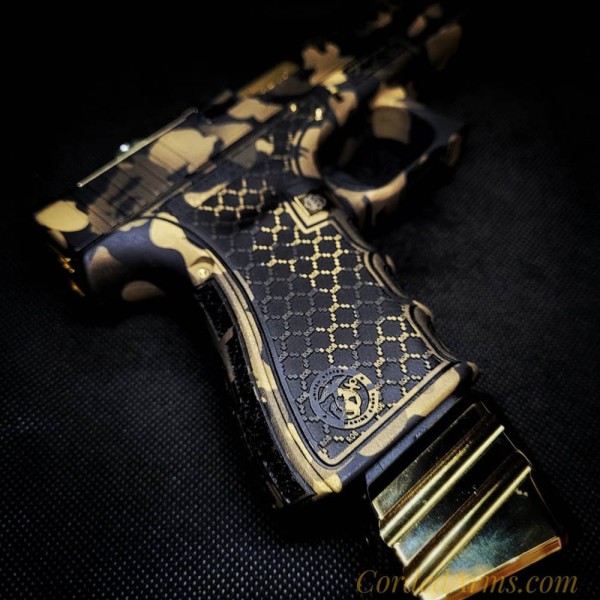 Custom Black & Gold Cerakote w/ Lasered Grips